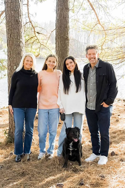 Ella with her family