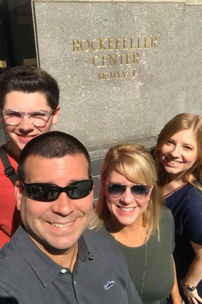 Laurie with family in New York