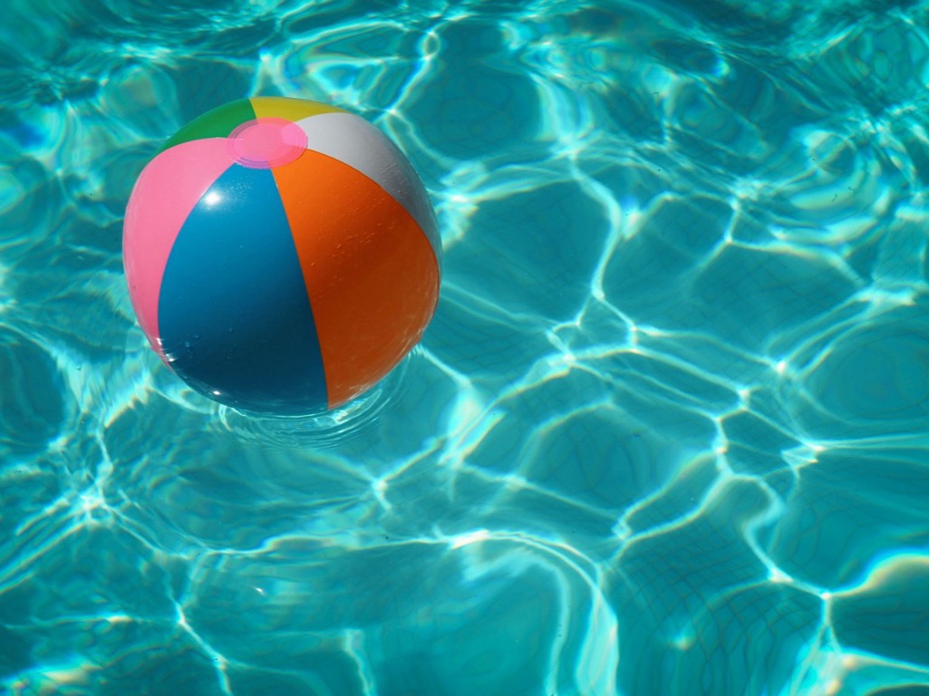 Beach ball floating in water