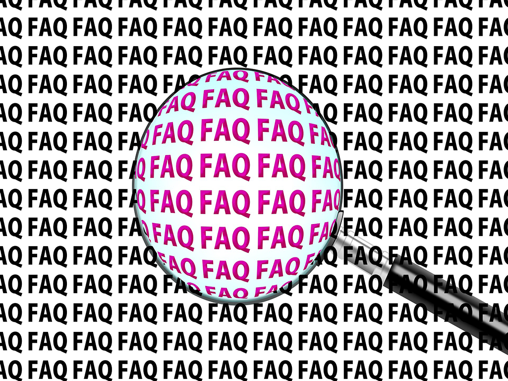 FAQ with magnifying glass